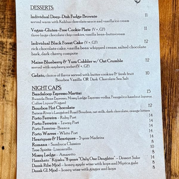A Bandaloop restaurant menu featuring desserts and night caps with prices.